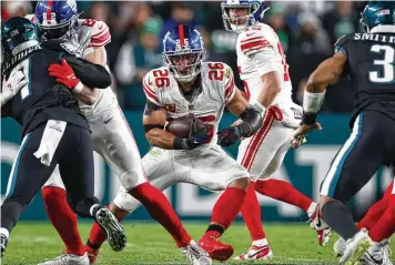  ?? RICH SCHULTZ / ASSOCIATED PRESS ?? The Giants seem ready to move on from running back Saquon Barkley, who they selected with the No. 2 overall pick in the 2018 draft. In 74 games over six seasons in New York, Barkley rushed for 5,211 yards with 35 touchdowns and caught 288 passes for 2,100 yards and 12 touchdowns. Barkley should get interest from plenty of teams, including a pair of New York’s NFC East rivals, Philadelph­ia and Dallas.