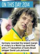  ??  ?? Germany recorded the largest margin of victory in a World Cup semi-final with a 7-1 demolition of hosts Brazil (skipper David Luiz pictured)