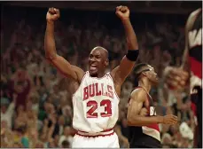  ?? JOHN SWART — THE ASSOCIATED PRESS ?? Michael Jordan celebrates during the Bulls’ victory over the Trail Blazers in Game 6 of the 1992 NBA Finals in Chicago.