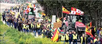  ?? — AFP photo ?? Spanish farmers march during a protest in demand of fair conditions for the agricultur­al sector, in Valladolid, northern Spain.