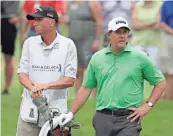  ?? ERICH SCHLEGEL, USA TODAY SPORTS ?? Phil Mickelson, right, says he and former caddie Jim “Bones” Mackay “have this relationsh­ip that spreads ( beyond) a lot more than just golf.”