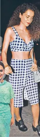  ??  ?? These printed co-ords by label Reformatio­n looked super chic! We love how Kangana made a double statement when she coupled her ensemble with a stand-out red lip and her signature head of
envy-inducing curls