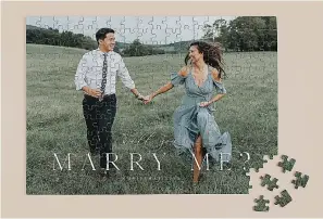  ?? ?? This image released by Minted shows a personaliz­ed puzzle. There are square and heart-shaped layouts, and you can pick black & white or color reproducti­ons. It’s a nice way to celebrate family moments. (Minted via AP)