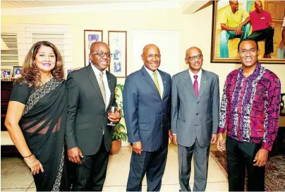  ??  ?? From left: Tamara Hill, Senator Pearnel Charles Jr, Senator Aubyn Hill, High Commission­er Ratnapala, and Minister of Finance Dr Nigel Clarke smile for the camera.