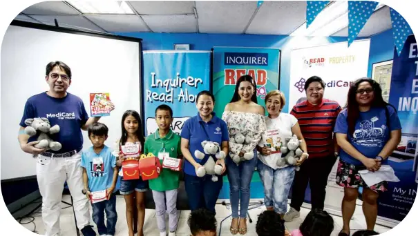  ??  ?? Kids were treated to an afternoon of storytelli­ng fun, prizes anand gifts during Medicard and Inquirer Property’s special Read- Along session. In photo are Medicard president Dr. Nicanor Montoya; MediCard marketing services manager Kate Cruz-Joaquin (fifth from left); GMA7 actress Marika Sasaki; Adarna House veteran storytelle­r Dyali Justo; Inquirer Property editor Theresa Samaniego; and Inquirer Lifestyle writing editor Ruth L. Navarra.