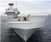  ??  ?? MISSION New aircraft carrier the HMS Queen Elizabeth