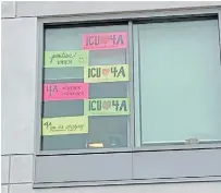  ?? NIAGARA HEALTH ?? Unit 4A team members find support from the other units in the hospital, who have put signs of support in the windows to let 4A workers know they are not alone in the battle against COVID-19.