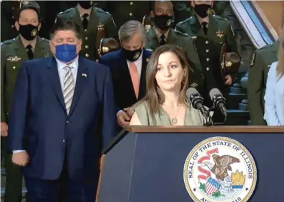  ?? BLUE ROOM STREAM ?? Lauren Frank, the wife of Illinois State Trooper Brian Frank, who was struck while responding to an accident in February, speaks at a bill-signing ceremony Thursday in Springfiel­d.