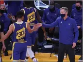  ?? DOUG DURAN — BAY AREA NEWS GROUP ?? The Warriors’ Stephen Curry (30) celebrates with coach Steve Kerr in the fourth quarter against the Los Angeles Clippers at the Chase Center in San Francisco on Jan. 8.