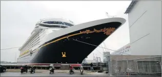  ?? PHOTOS BY PHIL REIMER/ FOR POSTMEDIA NEWS ?? The Disney Fantasy, built at Meyer Werft in Papenburg, Germany, is seen docked at the shipyard.