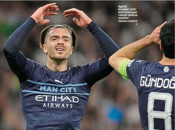  ?? AP ?? Agony: Grealish (left) and Gundogan cannot believe another missed chance