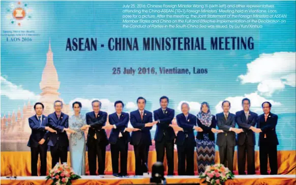  ??  ?? July 25, 2016: Chinese Foreign Minister Wang Yi (sixth left) and other representa­tives entatives attending the CHINA-ASEAN (10+1) Foreign Ministers’ Meeting held in Vientiane,ane, Laos, pose for a picture. After the meeting, the Joint Statement of the...