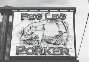  ??  ?? The restaurant’s name and logo are nods to the owner and pitmaster, who lost a leg to bone cancer. PHOTOS BY LARRY OLMSTED, SPECIAL TO USA TODAY