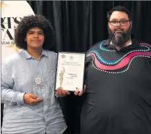  ?? ?? KOORI SPORTS STAR: Jandamarra Lauricella with John Gorton of Goolum Goolum Aboriginal Co-operative. Game Club.