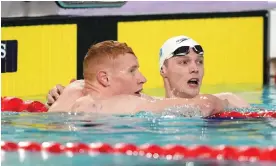  ?? Tim Goode/PA ?? Duncan Scott (right) edged out Tom Dean to win the 200m individual medley final. Photograph: