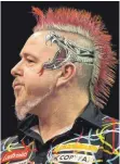  ?? FOTO: AFP ?? Star in der Dartsszene: der Schotte Peter Wright.