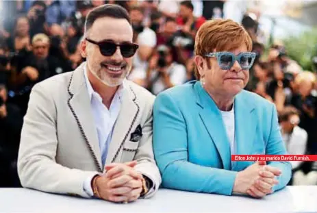  ??  ?? Elton John y su marido David Furnish.