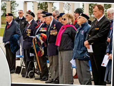  ?? ?? Emotional: The veterans join the commemorat­ion. Below: The memorial