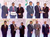  ??  ?? (Clockwise) Commercial Bank Managing Director S. Renganatha­n, Chief Operating Officer Sanath Manatunge, Chief Risk Officer Kapila Hettihamu and Deputy General Manager Marketing Hasrath Munasinghe accept the four awards won by the bank at Best Corporate Citizen Sustainabi­lity Awards