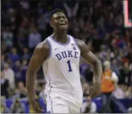  ?? NELL REDMOND - THE ASSOCIATED PRESS ?? Duke’s Zion Williamson (1) celebrates after Duke defeated Florida State in the NCAA college basketball championsh­ip game of the Atlantic Coast Conference tournament in Charlotte, N.C., Saturday, March 16, 2019.
