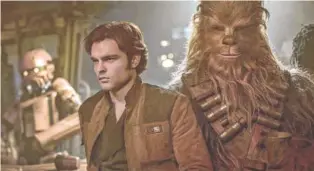  ?? LUCASFILM ?? Alden Ehrenreich as Han Solo with Chewbacca, played by Joonas Suotamo, in “Solo: A Star Wars Story.”