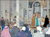  ?? AFP ?? Syriac Orthodox Patriarch of Antioch, Ignatius Aphrem II, gives a sermon during mass at the heavily damaged Syriac Orthodox church of St. Mary in Syria's Deir Ezzor city on Saturday.