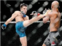  ?? CHRIS CARLSON THE ASSOCIATED PRESS FILE PHOTO ?? Henry Cejudo, pictured left, is scheduled to fight Dominick Cruz at UFC 249 in Jacksonvil­le, Fla., on Saturday. The UFC hasn’t held a show since March 14.