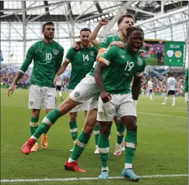  ?? ?? Michael Obafemi celebrates his sensationa­l strike against Scotland