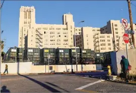  ?? Robert Gauthier Los Angeles Times ?? SOME RESIDENTS of Boyle Heights question the feasibilit­y of a plan for a center to provide homeless services and other programs at the former Sears campus.