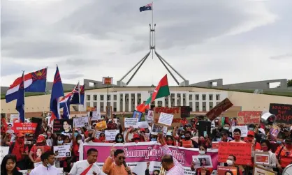  ?? Photograph: Mick Tsikas/EPA ?? The Morrison government is facing further calls to provide visa extensions for more than 3,000 Myanmar nationals in Australia.