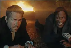  ??  ?? Ryan Reynolds and Samuel L Jackson carry the movie.