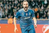  ?? FOTO: DPA ?? Die Freude des Torschütze­n: Gonzalo Higuain erzielte beim 2:0 im Hinspiel in Monaco beide Treffer für Juventus.