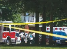  ?? MARK WEBER/THE COMMERCIAL APPEAL VIA AP ?? Shelby County Sheriff’s deputies work the scene where four young children were fatally stabbed at the Greens of Irene apartment on Friday in Memphis. Police took their mother into custody for questionin­g.
