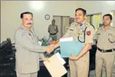  ?? HT PHOTO ?? Officers from India and Pakistan during a meeting at Sulemanki checkpost, Pakistan, on Wednesday.