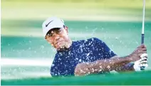  ?? AP-Yonhap ?? Tiger Woods of the United States hits a shot out of a bunker on the ninth hole during the pro-am event of the Zozo Championsh­ip PGA Tour at Accordia Golf Narashino C.C. in Inzai, east of Tokyo, Japan, Wednesday.