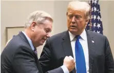  ?? Doug Mills / New York Times ?? Sen. Lindsey Graham, R-S.C. (left), was present when President Trump made a vulgar remark about certain immigrants.