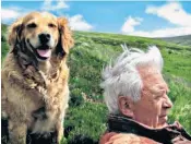  ??  ?? Mellor with his golden retriever, Corrie: his passion was birdlife