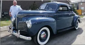  ?? GREG WILLIAMS/DRIVING ?? Alberta resident Arthur Lange and his 1940 Plymouth Club Coupe, with its glistening Aviation Blue paint job.