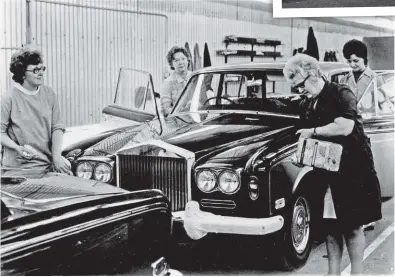  ??  ?? Rolls- Royce said of this image from the car finishing stage at their Crewe factory: ‘ Tender loving care – new Rolls- Royces receive all- important woman’s touch to bring them up to gleaming life.’