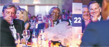  ??  ?? TOP TABLE: From left, Richemont chairman and lifetime achievemen­t award winner Johann Rupert, former president Thabo Mbeki and Times Media Group CEO Andrew Bonamour were prominent guests at the 2016 Sunday Times Top 100 Companies awards ceremony