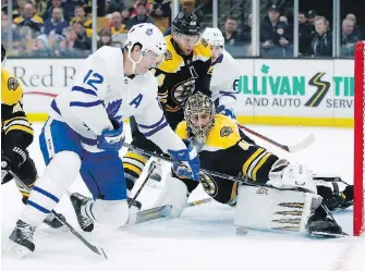  ?? MICHAEL DWYER, THE ASSOCIATED PRESS ?? Boston Bruins’ Jaroslav Halak blocks a shot by Toronto Maple Leafs' Patrick Marleau during the third period in Boston on Saturday. Boston won the game 6-3.