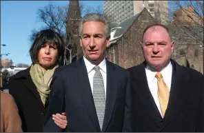  ?? (AP file photo) ?? Charles Kushner (center), with his wife, Seryl Beth, and attorney Alfred DeCotiis, arrives for a sentencing hearing in March 2005 in Newark, N.J., after he pleaded guilty to making false statements to the Federal Election Commission, to witness tampering, and to tax evasion. On Wednesday, President Donald Trump pardoned Kushner, the father of his son-in-law Jared Kushner.