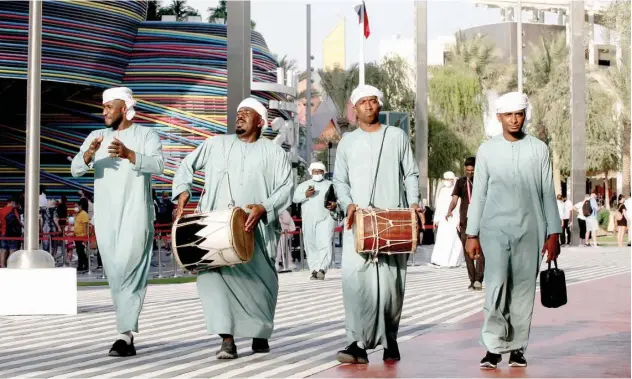  ?? Kamal Kassim / Gulf Today ?? ↑
The troupe performs at Expo 2020 Dubai.