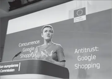  ?? Virginia Mayo Associated Press ?? COMPETITIO­N COMMISSION­ER Margrethe Vestager discusses the European Union’s record $2.7-billion fine against Google during a news conference at EU headquarte­rs in Brussels on Tuesday.