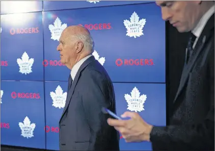  ?? CP PHOTO ?? Toronto Maple Leafs general manager Lou Lamoriello enters an end-of-season press conference Friday in Toronto.