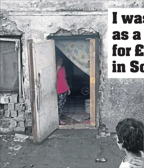  ??  ?? Adriana Adiova, in the doorway of her flat in Trebisov, Slovakia, reveals how she was tricked to Scotland and sold as a slave