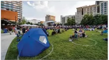  ?? TOM GILLIAM / CONTRIBUTE­D ?? In-person concerts are back at Levitt Pavilion in Dayton for 2021, after the 2020 in-person concert season was canceled due to the COVID-19 pandemic. As the outlook continues to improve, Ohio’s state of emergency order is now over.