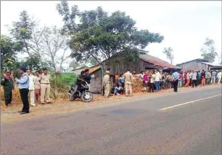  ?? ADHOC ?? Authoritie­s stop villagers from blocking a road to protest their dispute with the Memot Rubber Company in Kratie in 2015. Locals have renewed their protest there this week.