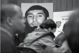  ?? ASSOCIATED PRESS ?? A PHOTO OF SAYFULLO SAIPOV IS DISPLAYED at a news conference at One Police Plaza Wednesday in New York. Saipov is accused of driving a truck on a bike path that killed several and injured others Tuesday near One World Trade Center.