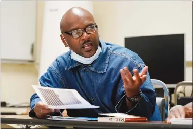  ?? (AP/Eric Risberg) ?? Incarcerat­ed student Derry Brown gestures April 12 while speaking during a Mount Tamalpais College English class called Cosmopolit­an Fictions at San Quentin State Prison in San Quentin, Calif.